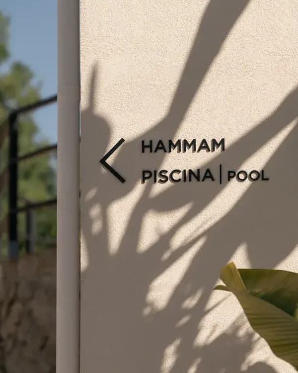 Sign pointing to the hammam and pool at Shanti-Som Algarve